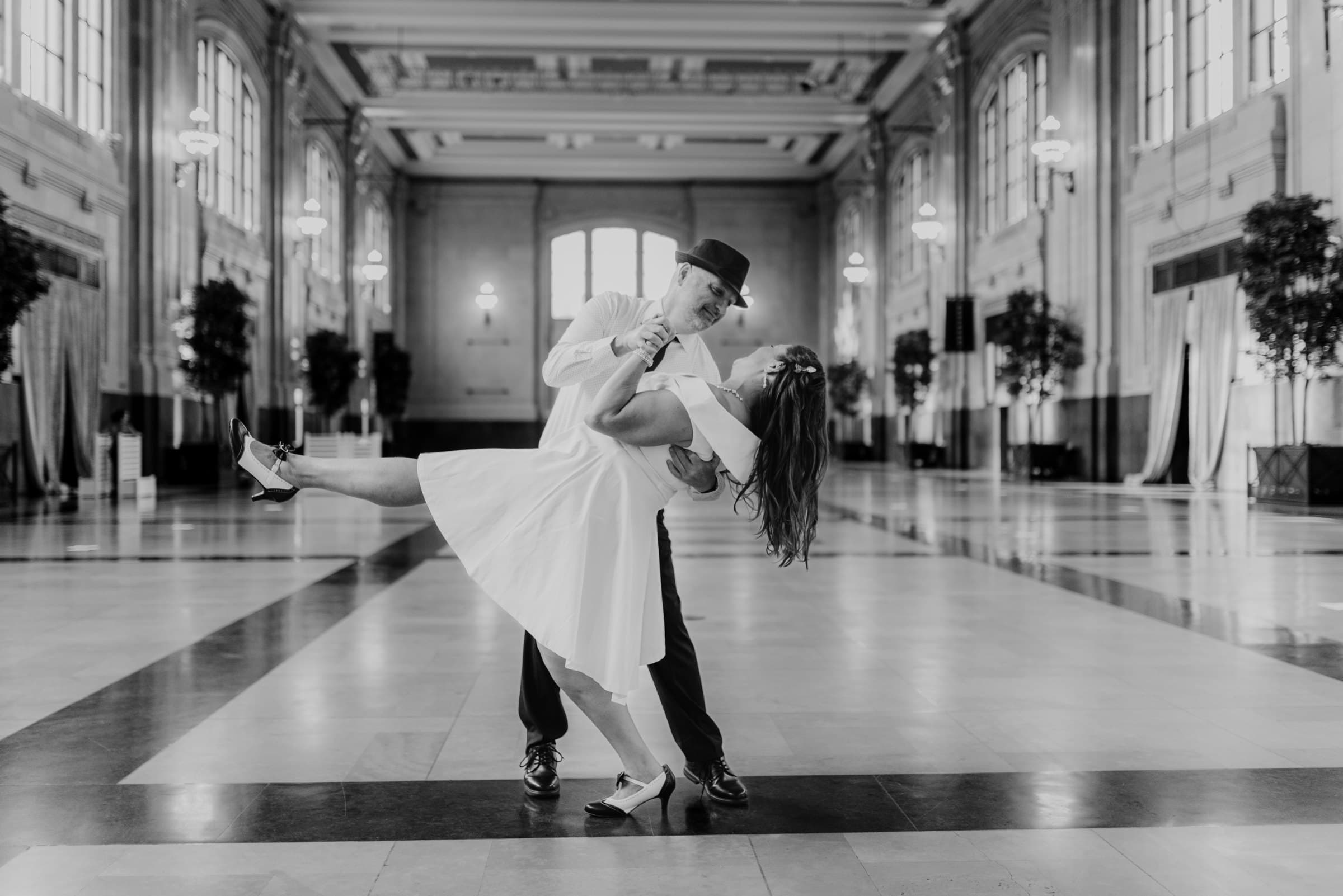Benjamin dipping Heather as they dance together