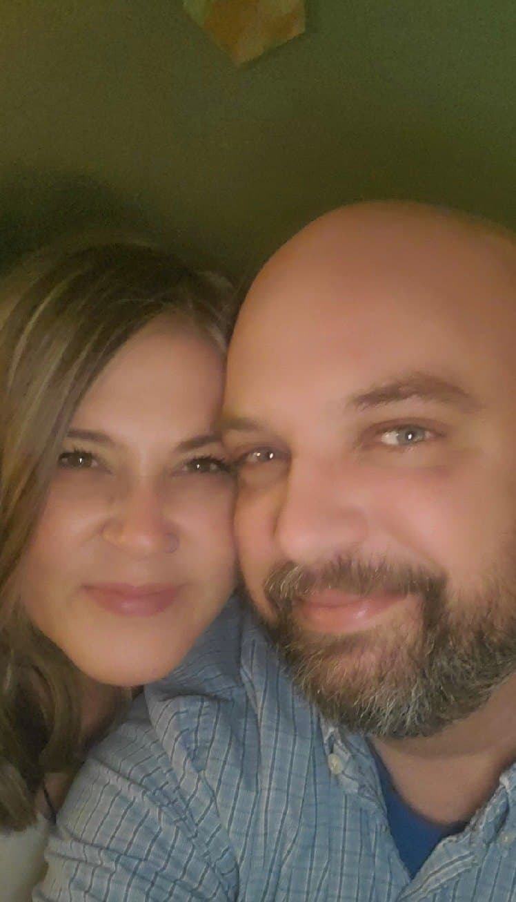 Benjamin and Heather, cheek to cheek, in one of their early selfies